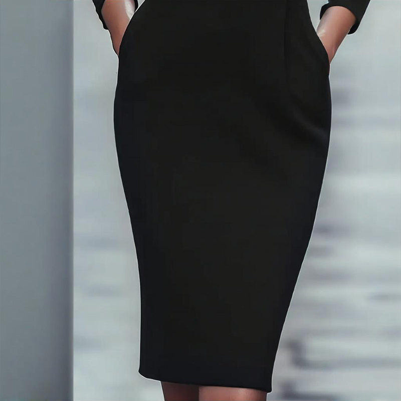 Black long-sleeve bodycon midi dress with fitted silhouette