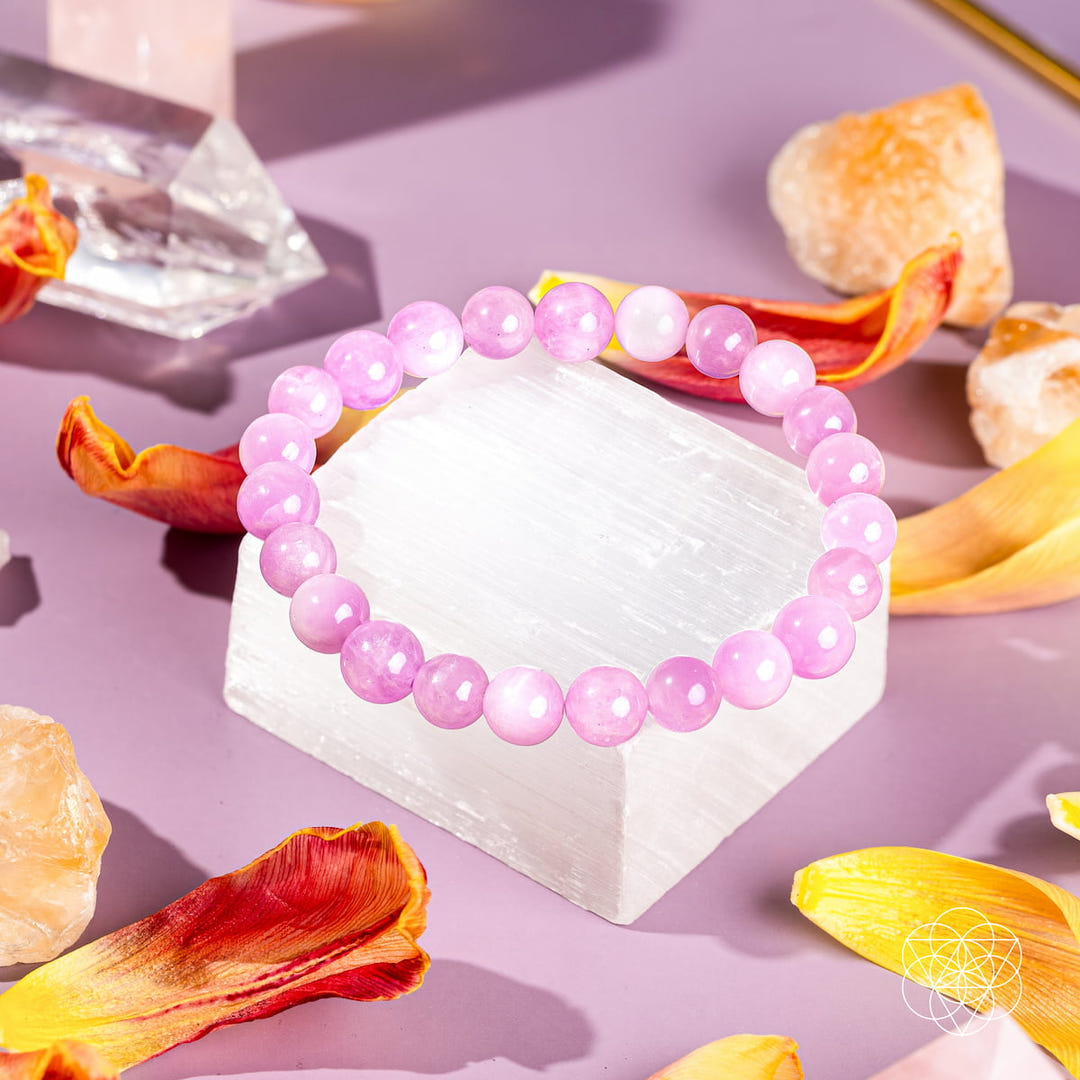 Pink kunzite bracelet with polished round beads