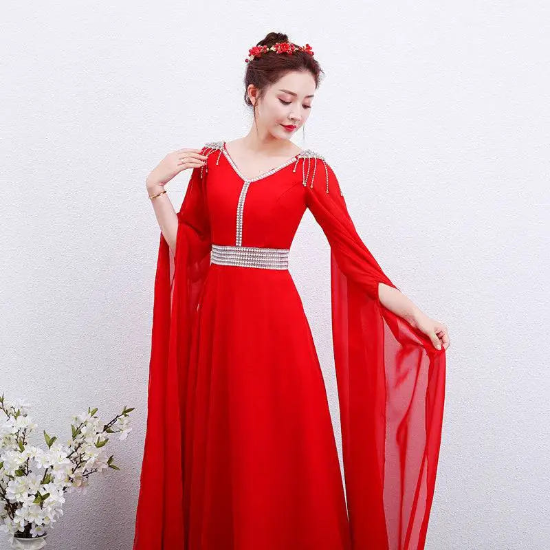 Red cape-sleeve embellished gown image 2