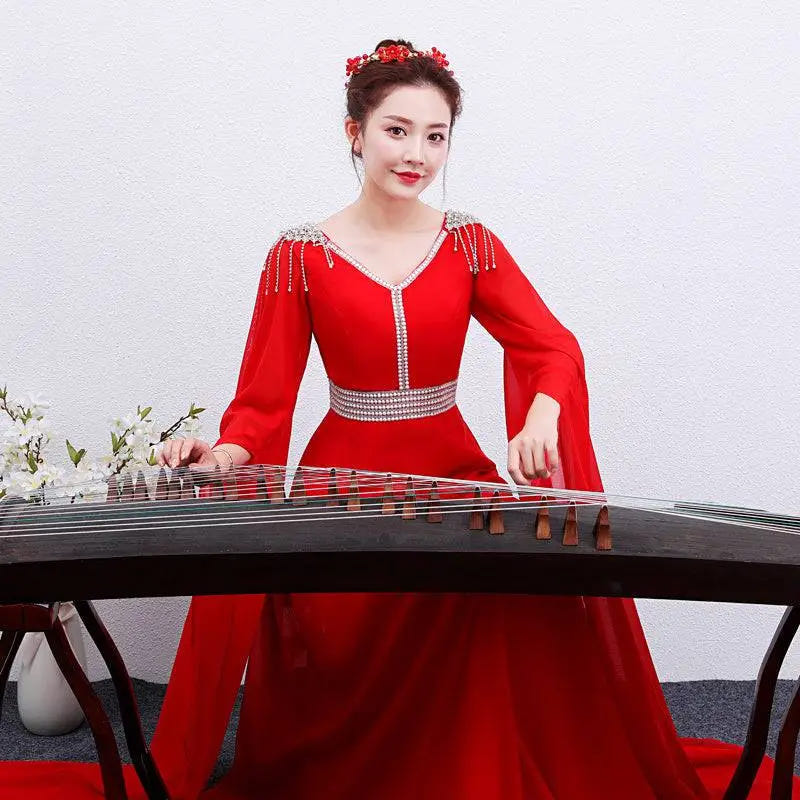 Red cape-sleeve embellished gown image 3