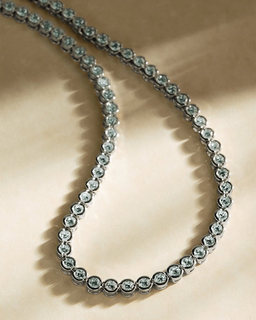CZ hoop earrings, tennis necklace and bracelet set view 3