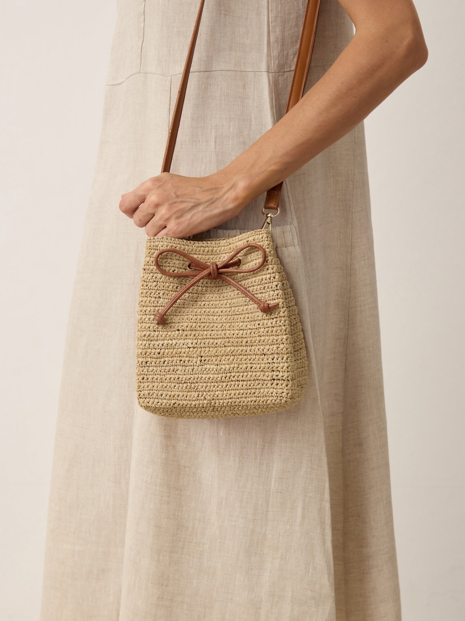 Mini raffia crossbody bag, drawstring detail
