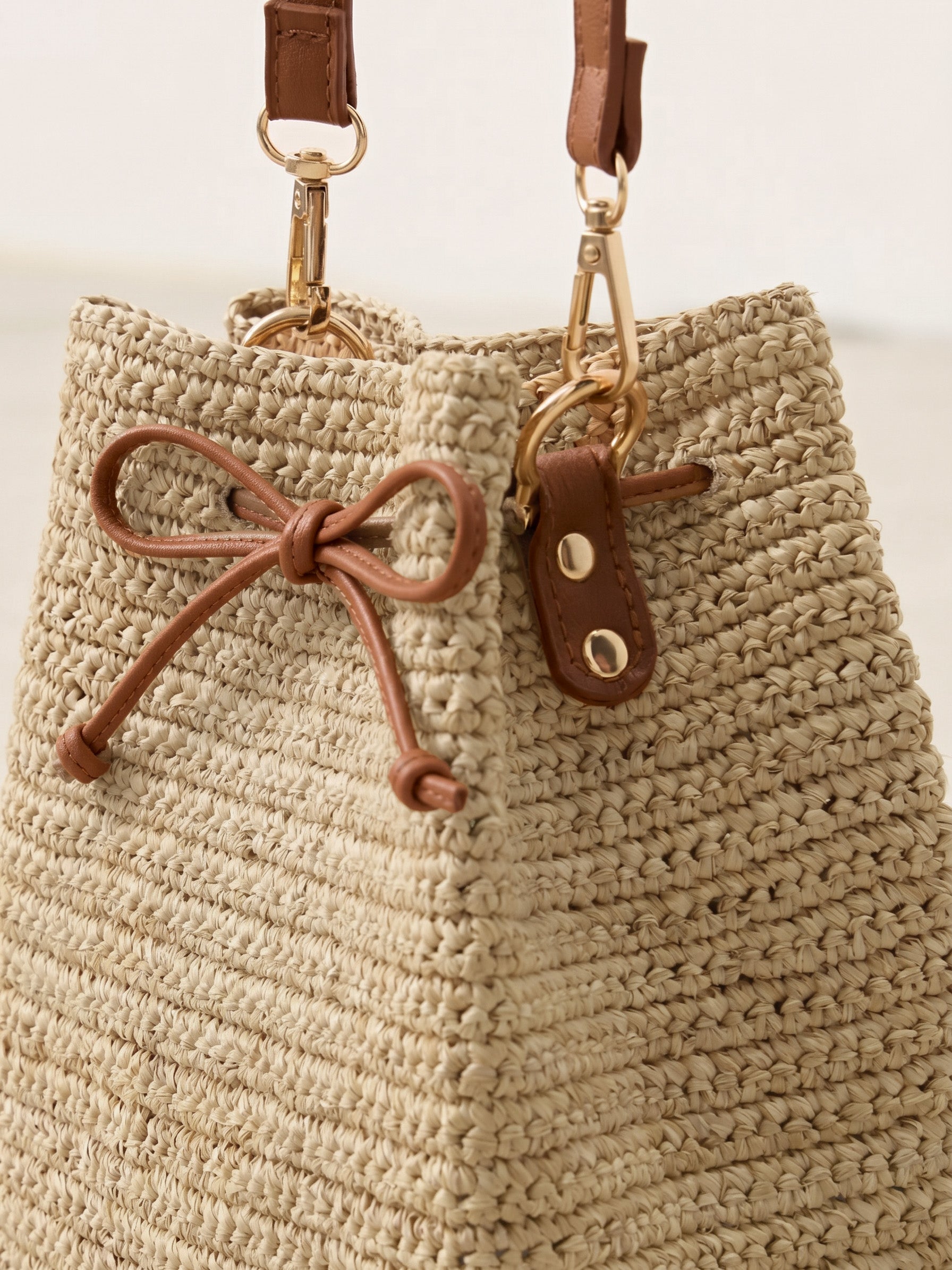 Mini raffia crossbody bag, styled view