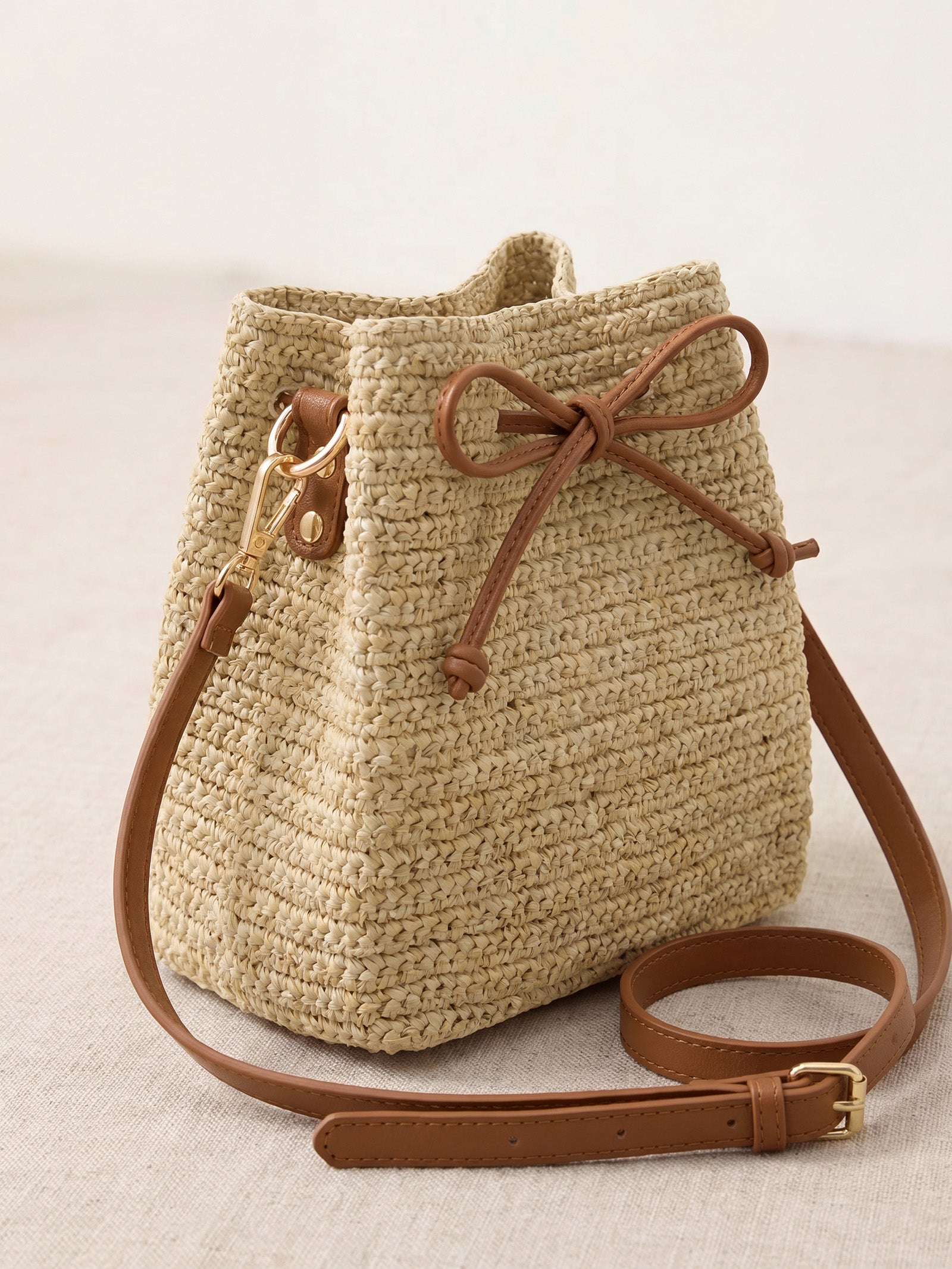 Mini raffia crossbody bag, close-up view