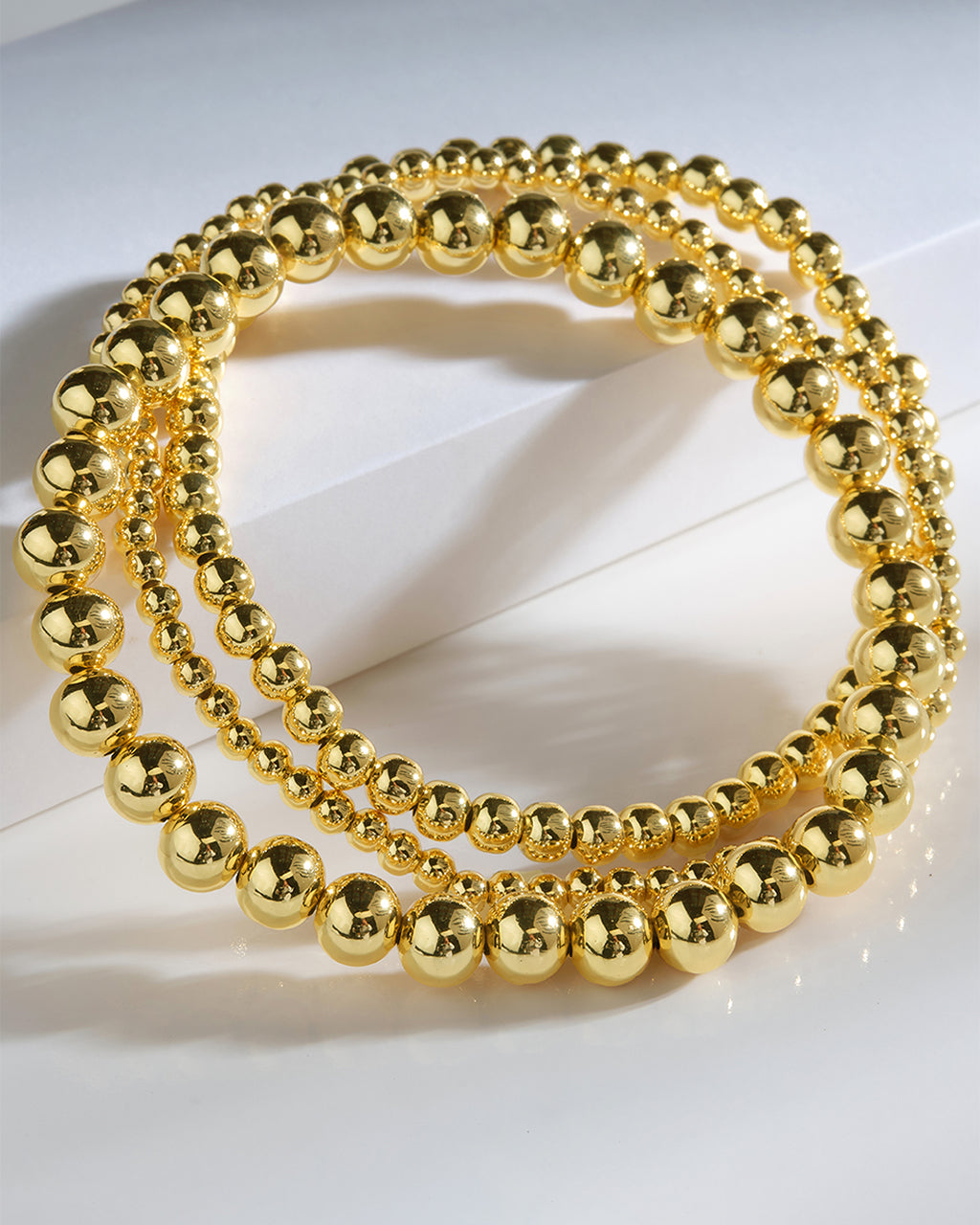 Gold beaded stretch bracelet set, alternate view