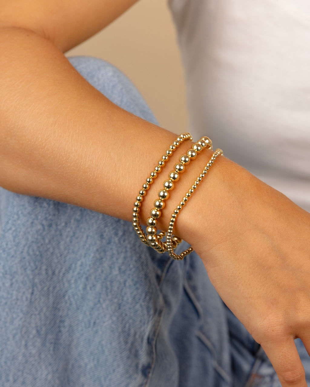 Gold three-piece beaded stretch bracelet set, alternate view