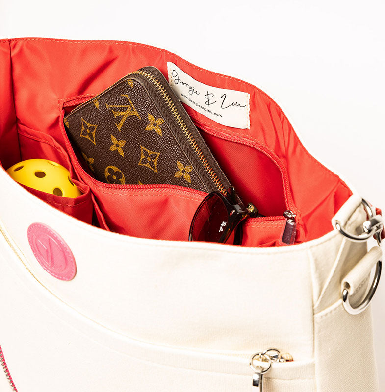 Parker cream pickleball bag with ball
