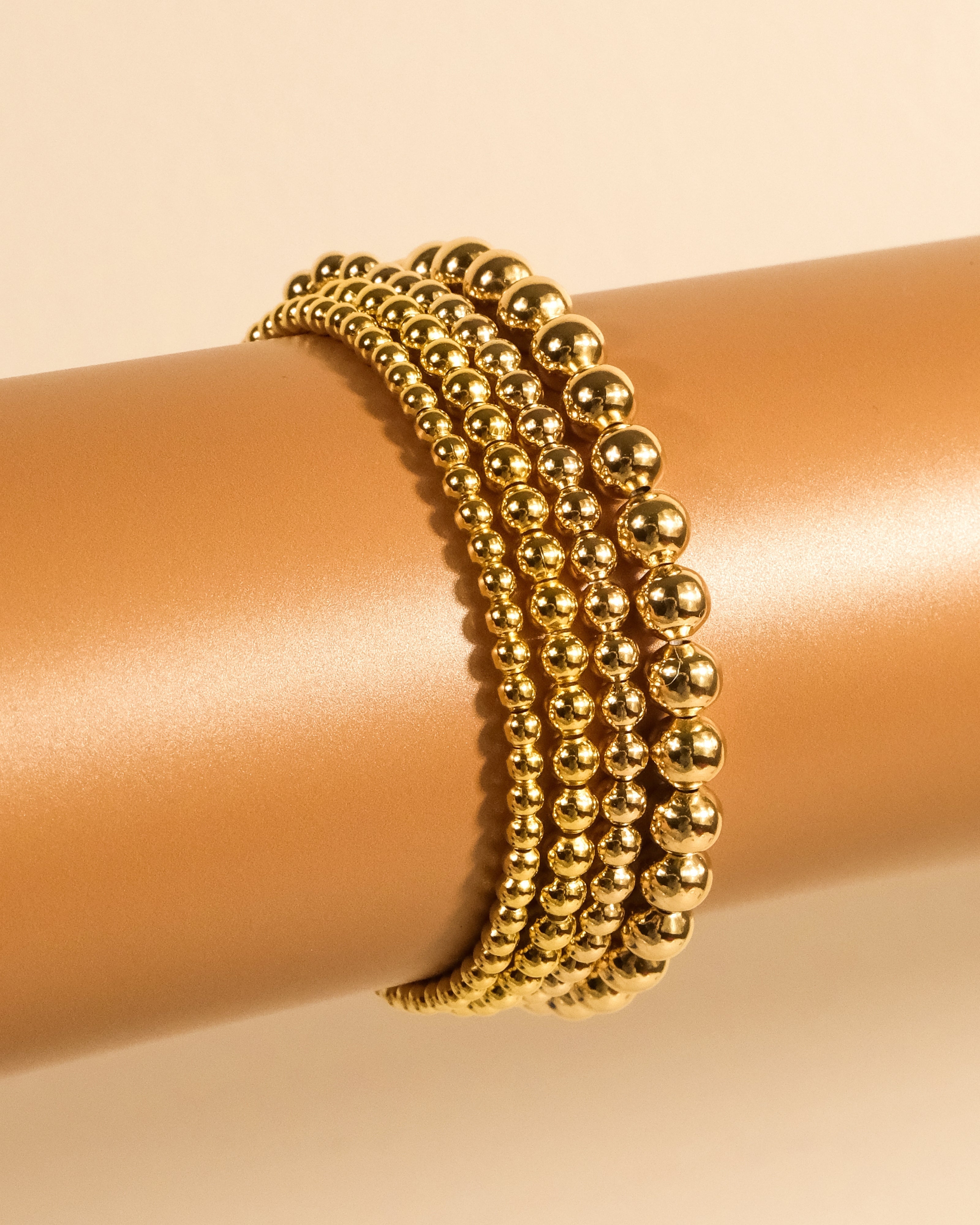 Beaded stretch bracelet sets in assorted finishes