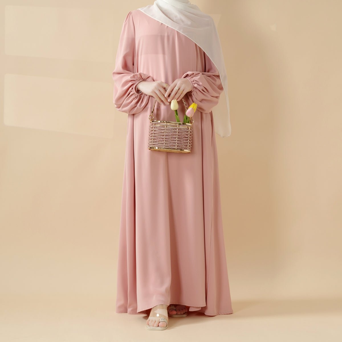 Softly pleated everyday abaya with a relaxed modest silhouette