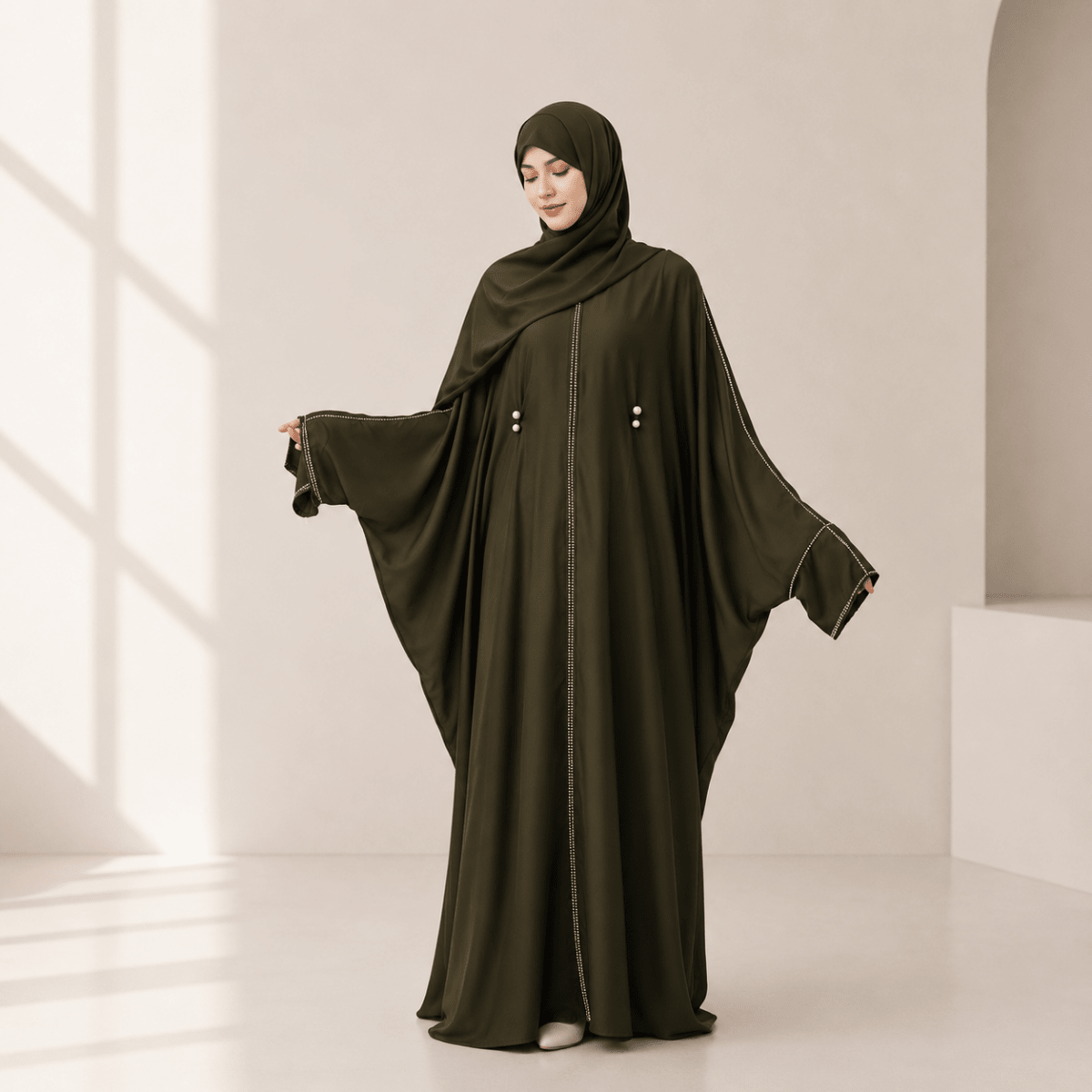 Fluid batwing abaya with a coordinating matching hijab