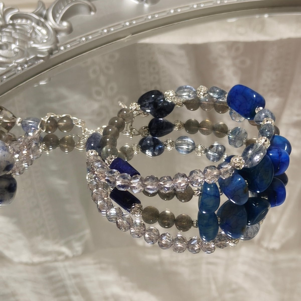 Sculptural polished link bracelet with open buckle