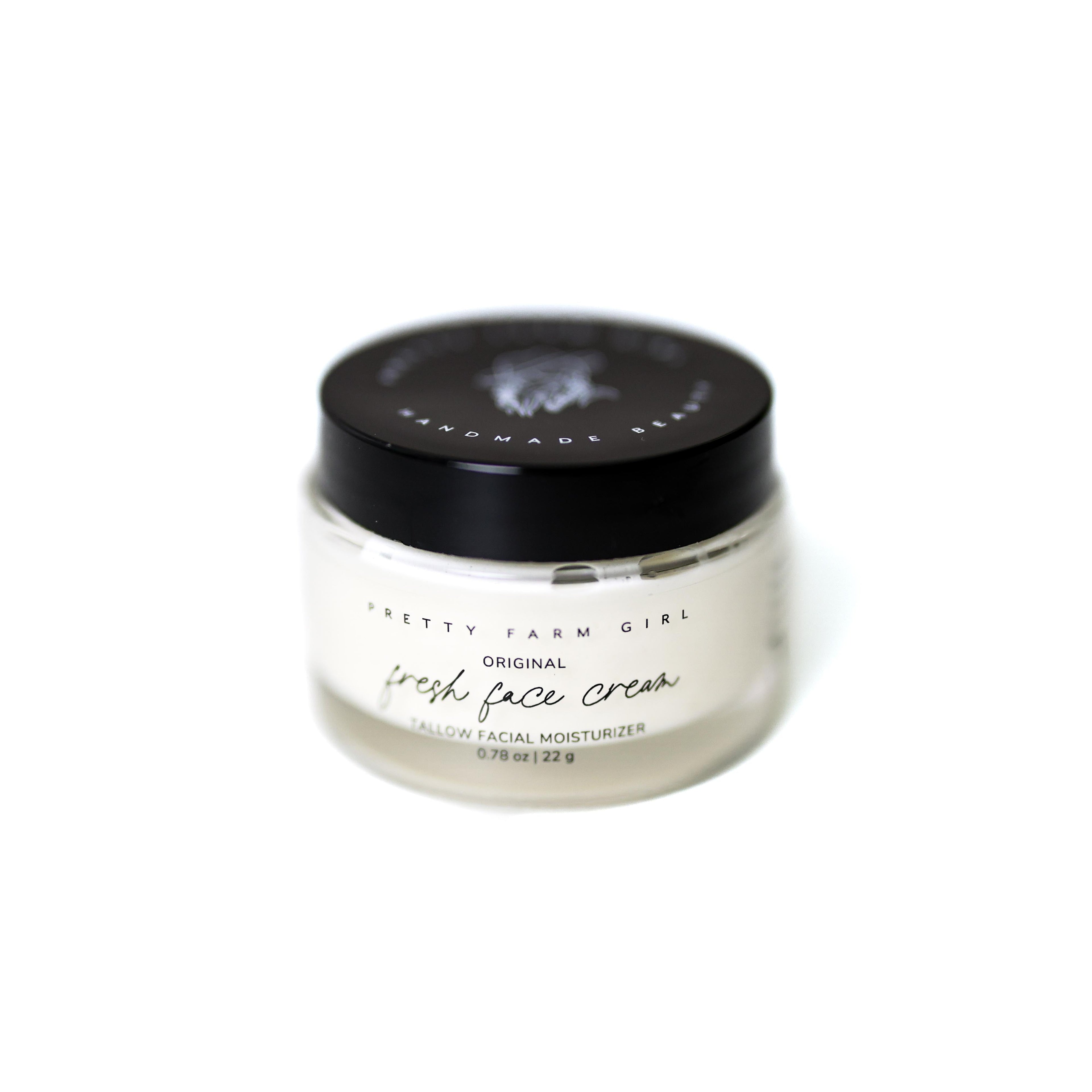 Fresh Face tallow moisturizer jar on a white background