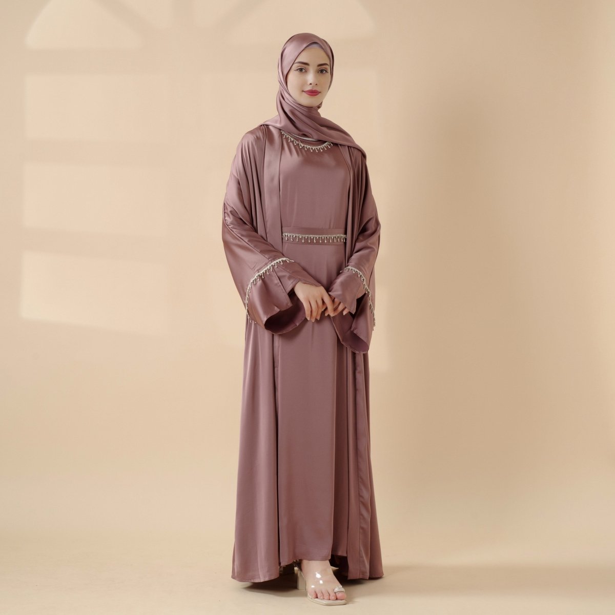 Satin six-piece abaya set with diamond-tassel belt