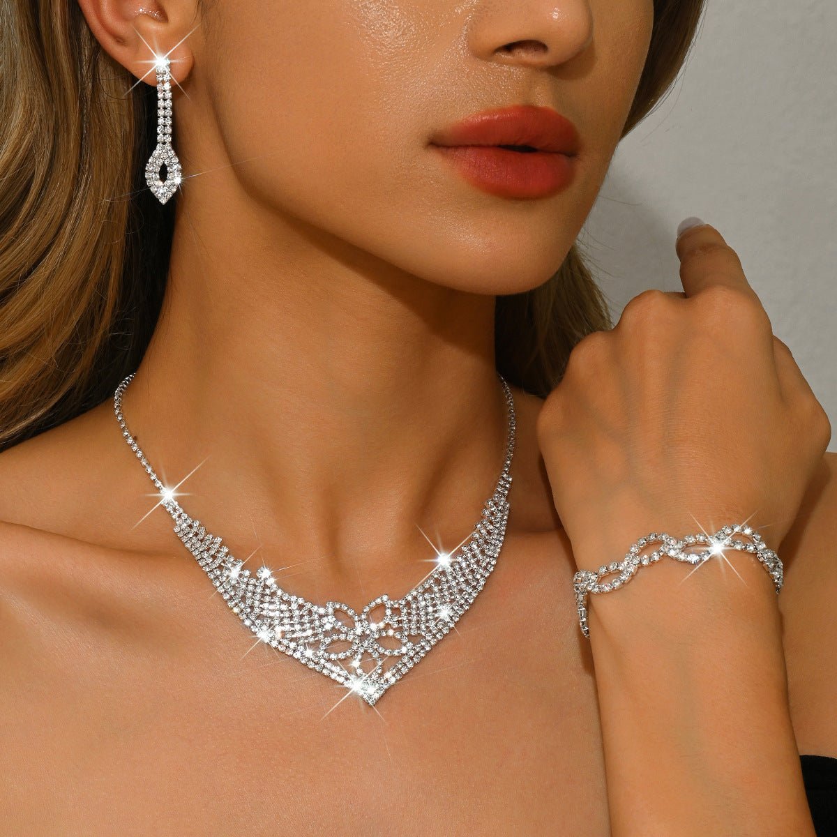 Rhinestone jewelry trio with necklace, earrings and bracelet