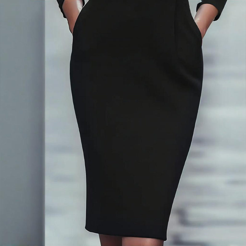 Black long-sleeve bodycon midi dress with fitted silhouette