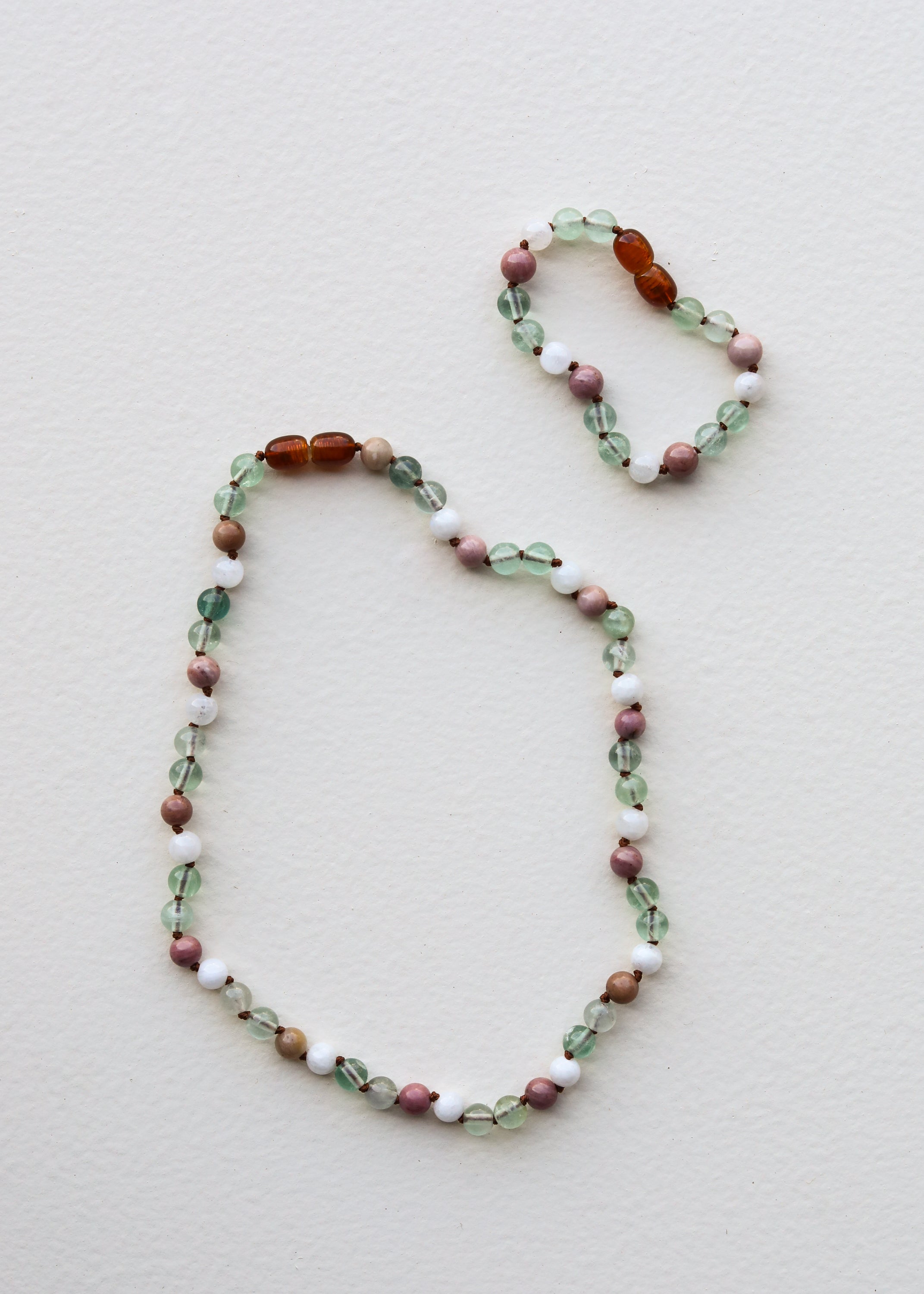 Fluorite, moonstone and rhodonite bracelet, side view